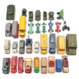 An assortment of play-worn Dinky and Dinky Supertoys model vehicles, comprising military and