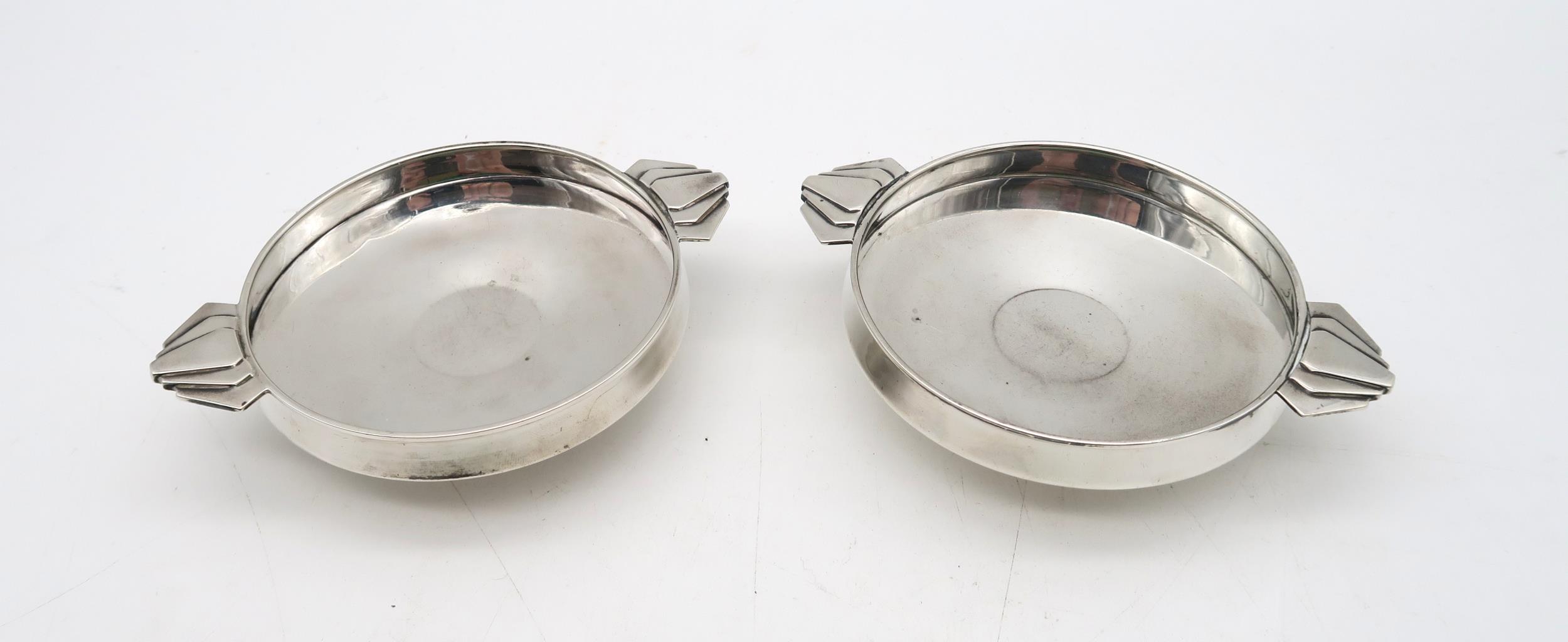 A pair of silver sweetmeat dishes, by Adie Brothers Ltd, Birmingham 1930, with stylised twin