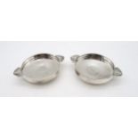 A pair of silver sweetmeat dishes, by Adie Brothers Ltd, Birmingham 1930, with stylised twin