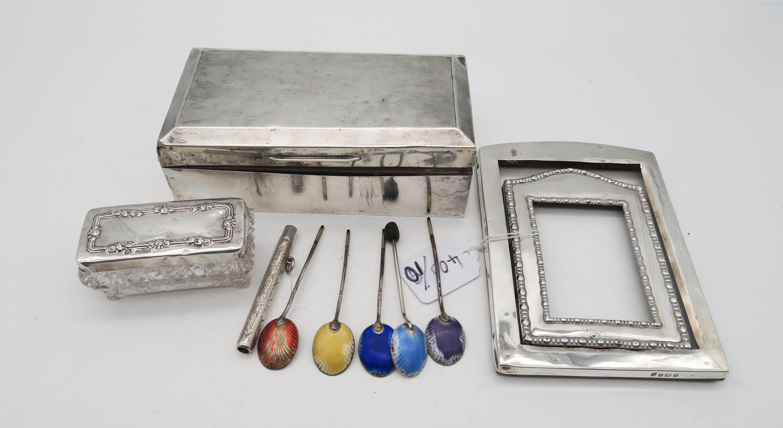 A collection of silver including a silver cigarette box (af), London, marks rubbed, with engine