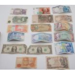 A lot comprising late twentieth century banknotes together with various coins and tokens Condition