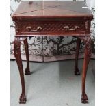 A late Victorian mahogany envelope card table with folding top over single drawer on cabriole