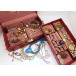 A jewellery box filled with vintage costume jewellery to include a Cockatiel brooch, a Baume