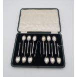 A cased set of silver seal top tea spoons and sugar tongs, by Cooper Brothers & Sons, Sheffield