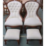 A pair of 20th century spoon back nursing chairs with button upholstery both with footstools (4)