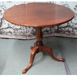 A 19th century mahogany circular tilt top table on tripod base, 71cm high x 84cm diameter