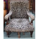 A Victorian walnut framed open armchair with floral Damask upholstery on turned supports, 89cm