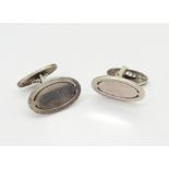 A pair of silver Georg Jensen cufflinks, pattern number 75. Condition Report:Available upon request