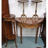 An early 20th century demilune single drawer side table, walnut two tier plant stand and a pair of