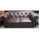 A contemporary brown leather button back upholstered club style two seater sofa, 73cm high x 185cm