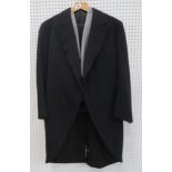 A gentleman's mourning suit comprising black jacket, grey stripe trousers, black and a grey