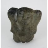 A 20TH CENTURY INUIT SOAPSTONE CARVING OF A FIGURE WITH HANDS ALOFT 20.5cm high (8") Condition
