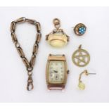 A collection of gold and yellow metal items to include and 9ct gold mounted fob seal, a pentagram