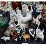 A collection of animal and bird figures including Beswick skunk, Babycham fawn, Koala, pig, Nao dogs