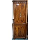 A 20th century walnut veneered corner drinks cabinet, 173cm high x 59cm wide and a two tier mahogany