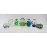 A collection of glass paperweights  Condition Report:Available upon request