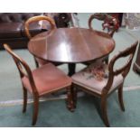 A Victorian circular tilt topped breakfast table and two pairs of Victorian balloon back dining