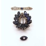 A 10k blue gem brooch, weight 0.6gms, together with a (af) sapphire brooch mounted in white metal,