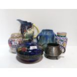 A collection of decorative ceramic including Reubens Ware pomegranate decorated pot and cover, Poole