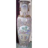 A very large Oriental style vase depicting court scenes, 183cm high Condition Report:Available