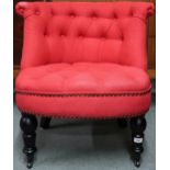 A contemporary Tudor red fabric button back upholstered "Bouji" chair on ebonised turned supports,