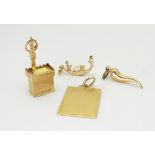 A collection of four 18ct gold pendants to include Florence's Arnolfo tower, and a Gondolier, weight