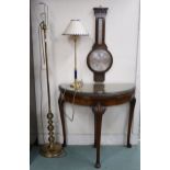 A 20th century walnut veneered demilune fold over table, oak barometer thermometer, brass standard