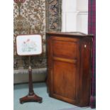 A Victorian mahogany panel doored hanging corner cabinet, 105cm high x 81cm wide and a Victorian