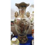A large modern Chinese baluster vase, gilt decorated with flowers and ladies amongst a landscape,