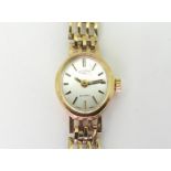 A 9ct gold ladies Rotary Quartz watch and strap, weight including mechanism 10.8gms  Condition