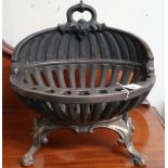 An early 20th century cast iron fire basket, 41cm high x 39cm wide x 34cm deep Condition Report: