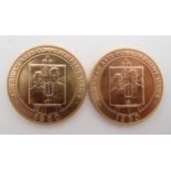 AMERICAN ARTS COMMEMORATIVE MEDALLIONS Two 1980 Grant Wood One Ounce Gold Medals. The obverse design