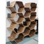 A contemporary Walnut veneered laminate Luka Stepan "Polygon" shelving unit, 149cm high x 136cm wide