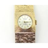 A 9ct gold ladies Realm wristwatch, weight including mechanism 40.3gms  Condition Report:Available