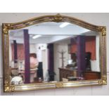 A 20th century gilt framed overmantle mirror, 88cm high x 129cm wide  Condition Report:Available