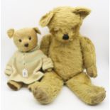 Two vintage mohair teddy bears, the larger (measuring approx. 72cm in overall height) being a