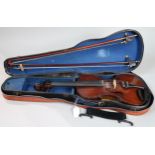 A German two piece back violin 35.5cm bearing stamp to the under scroll CONSERVATORY VIOLIN