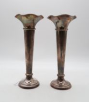 A pair of silver trumpet vases, by Walker & Hall, Sheffield 1941, bases loaded, 27.5cm (2) Condition