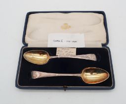 A cased pair of George III Old English pattern silver fruit spoons, probably by John Lambe, London