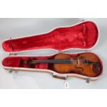 A two piece back violin 35cm bearing label to the interior Dominicus Montagnana Sub Signo Cremonae