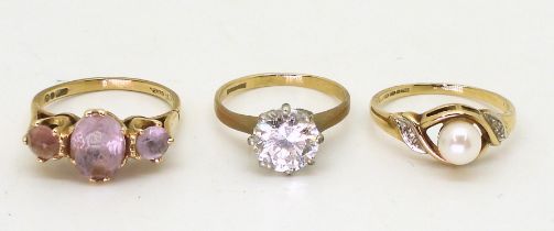 Three 9ct gold rings, amethyst, size K1/2, clear gem solitaire, size I1/2, pearl and diamond