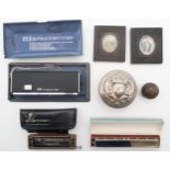 An eclectic mixed lot, to include a late-19th century gutty-type golf ball, two Indian portrait