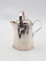 An Edwardian silver lidded milk jug, by Jones & Crompton, Birmingham 1903, 113gms, 10cm with