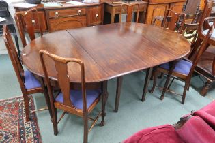 A Georgian mahogany D end dining table with two D end tables joined by central table with two