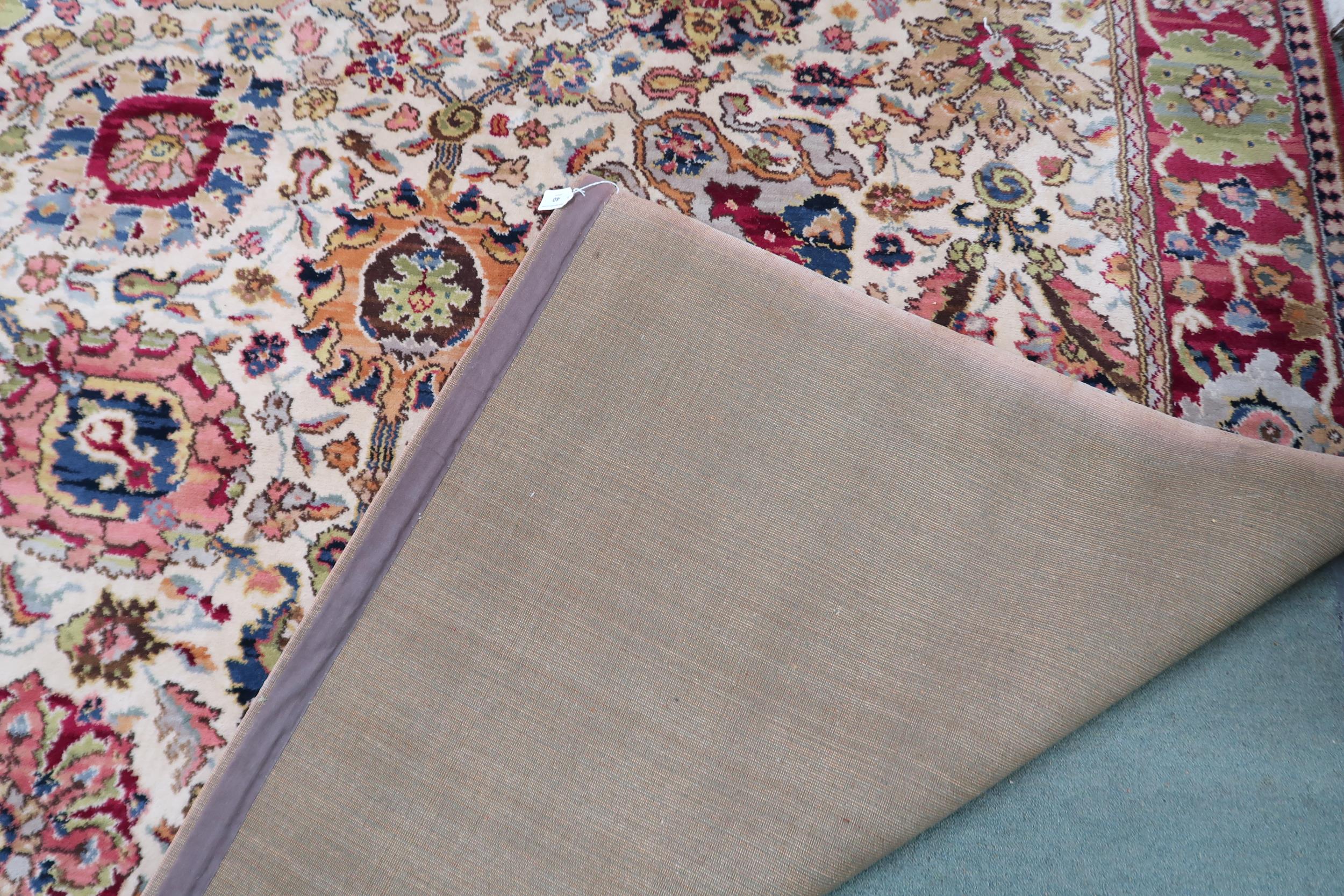 A cream ground James Templeton & Co Ltd carpet with all over floral patterned ground and red - Image 3 of 8