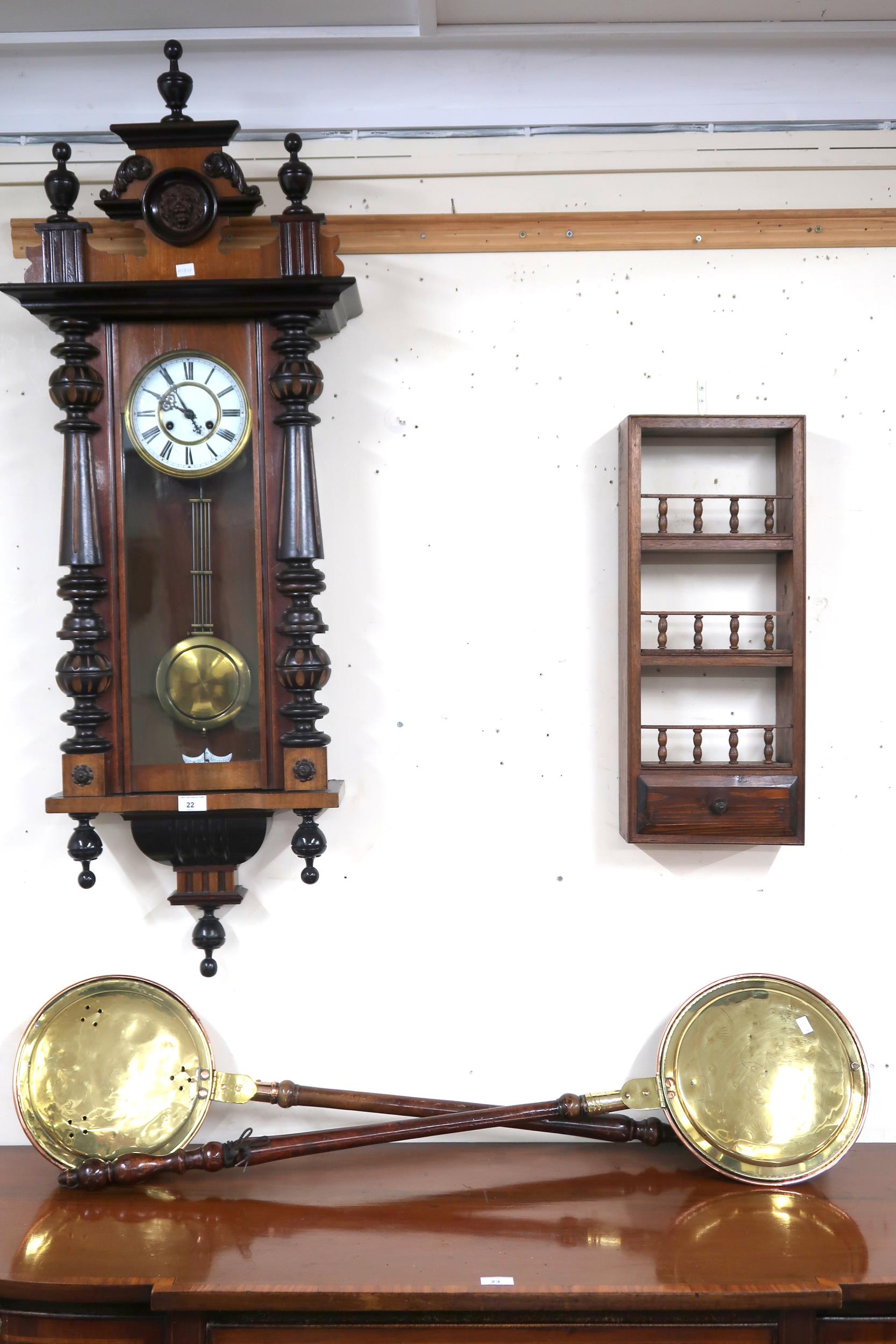A lot comprising Austrian style mahogany cased wall clock, two brass and copper bed warming pans and