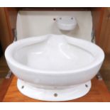 A 20th century teak wall mounted cabin sink with fall front compartment concealing ceramic basin and