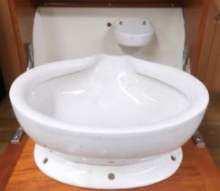 A 20th century teak wall mounted cabin sink with fall front compartment concealing ceramic basin and