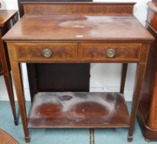 A late Victorian mahogany buffet table with two drawers on square tapering supports joined by