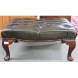 A 20th century forest green leather button upholstered footstool on cabriole supports, 30cm high x